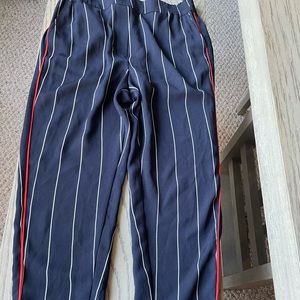 Anthropologie pull on slacks.  Red-orange piping and blue pants with pin stripe
